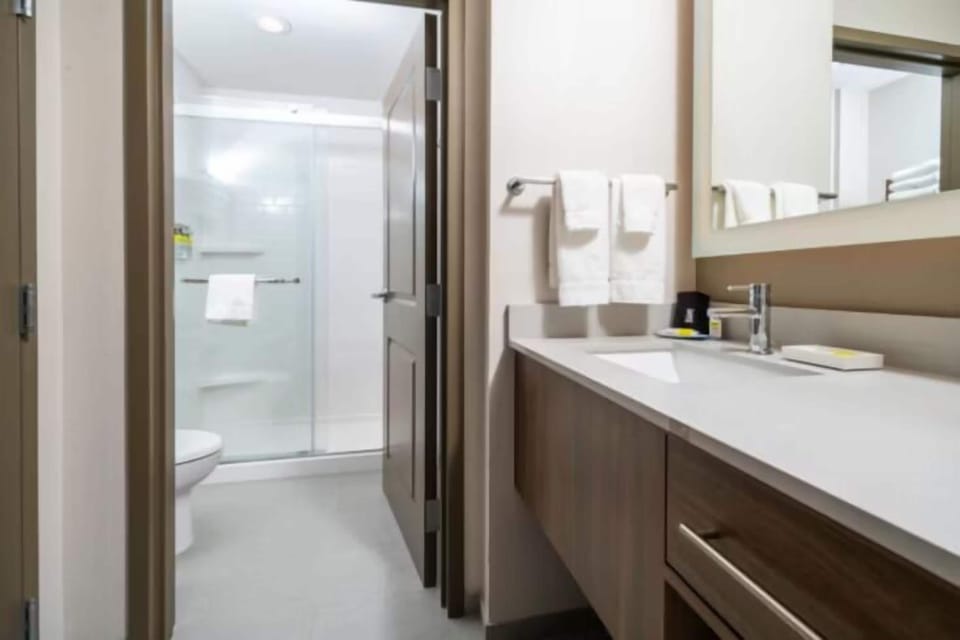 Designer toiletries, hair dryer, towels, soap