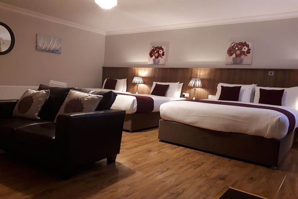 Family Room - Courtyard | Premium bedding, individually decorated, individually furnished