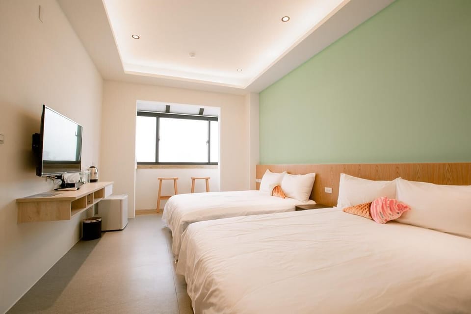Quadruple Room | Premium bedding, down comforters, memory foam beds, desk