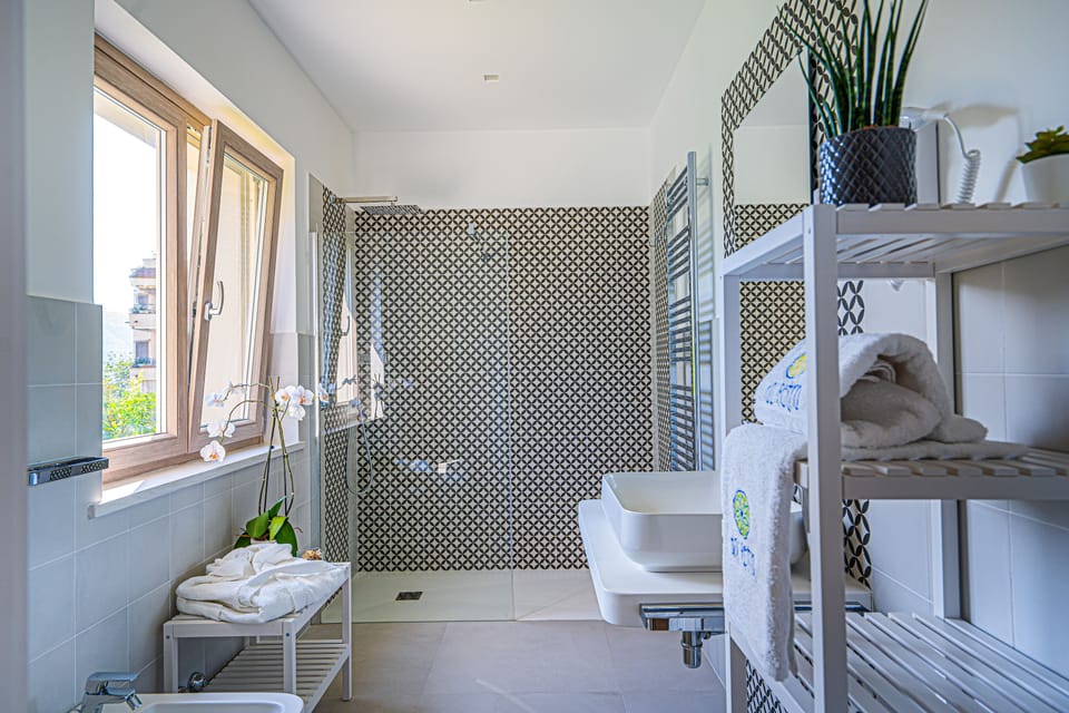 Superior Double or Twin Room, Terrace | Bathroom | Shower, rainfall showerhead, hair dryer, slippers