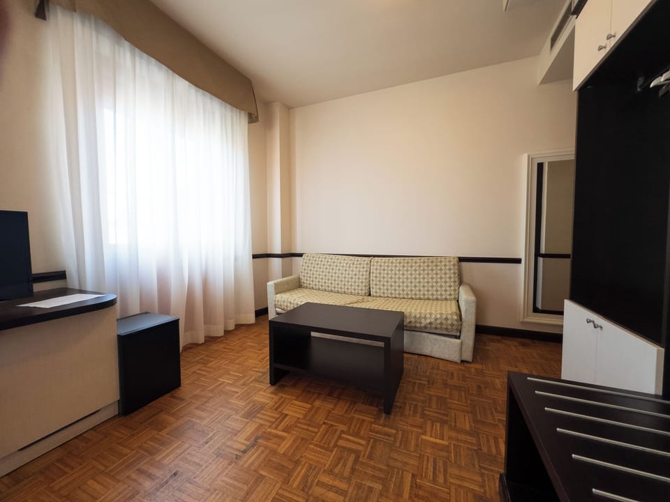 Standard Room, 1 Double Bed | Minibar, in-room safe, desk, iron/ironing board