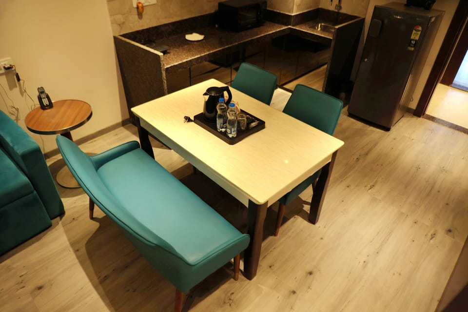 Superior Suite | Living area | 43-inch Smart TV with satellite channels