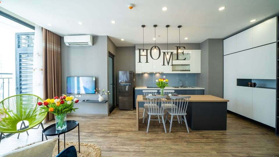 Premium Suite, 2 Bedrooms, 2 Bathrooms | Living area | 68-inch Smart TV with cable channels, TV, pay movies