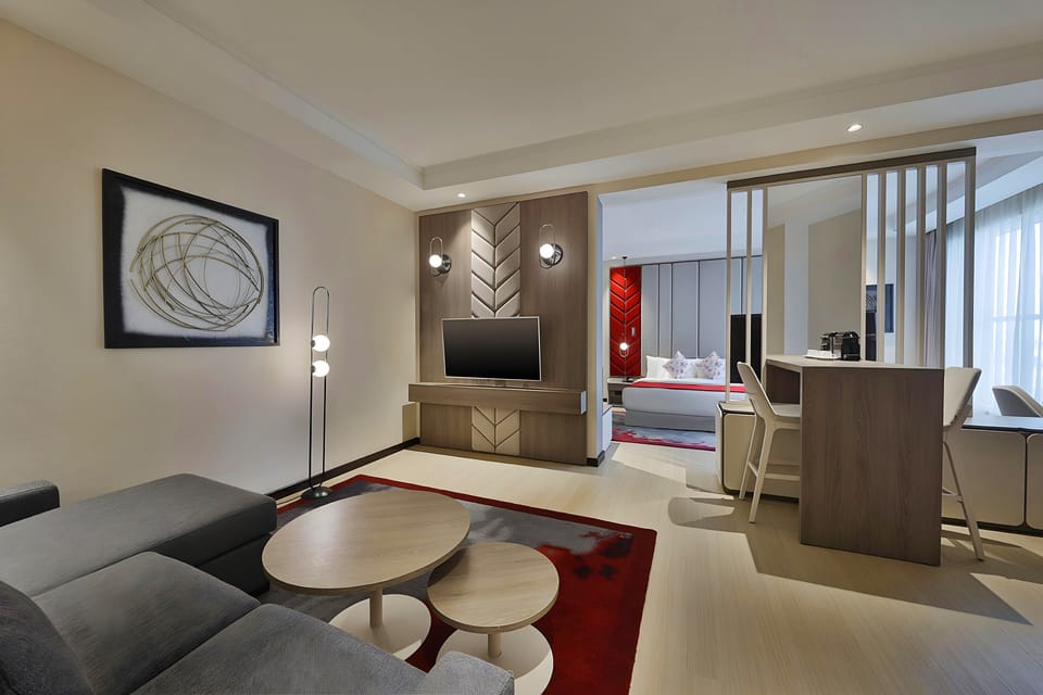 Premium bedding, down comforters, minibar, in-room safe