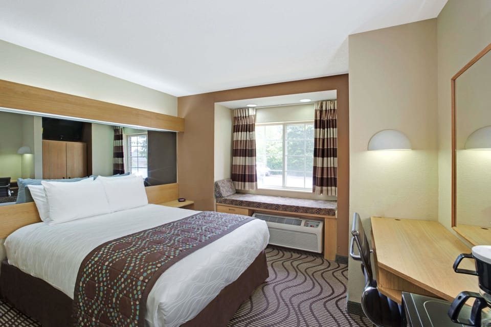 Premium bedding, down comforters, in-room safe, desk