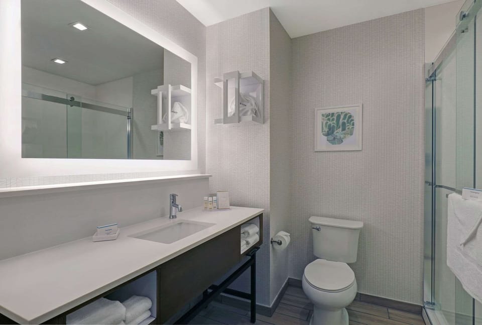 Room, 2 Queen Beds, Refrigerator | Bathroom shower