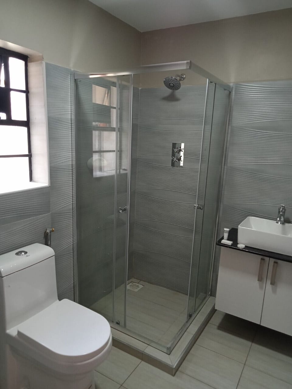 Executive Room | Bathroom | Free toiletries, slippers, towels, soap