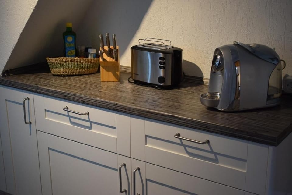 Apartment, 1 Bedroom | Private kitchen | Coffee/tea maker, electric kettle, highchair, mixer