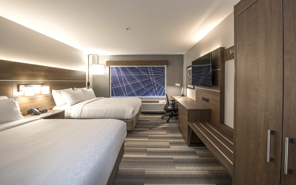 Hypo-allergenic bedding available, in-room safe, desk, laptop workspace