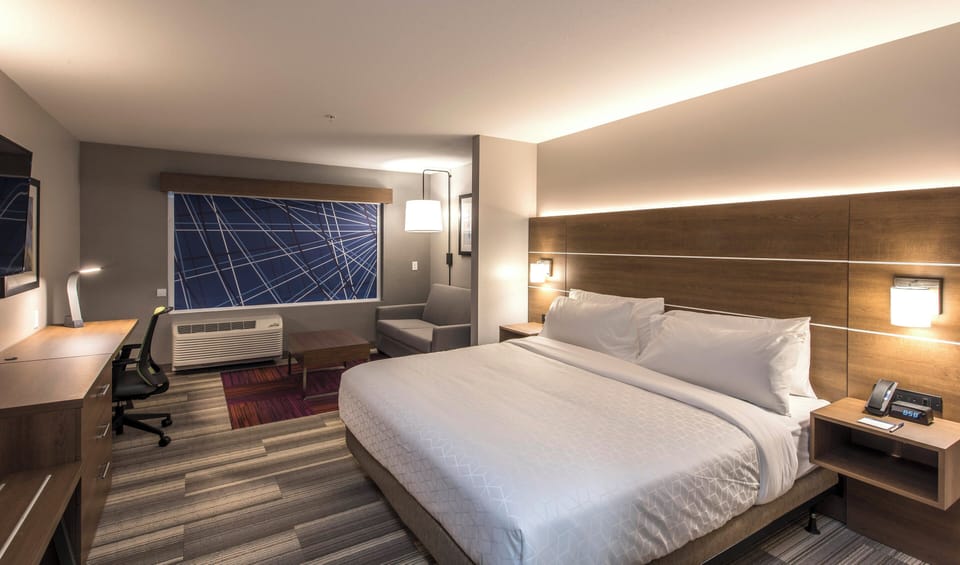 Hypo-allergenic bedding available, in-room safe, desk, laptop workspace