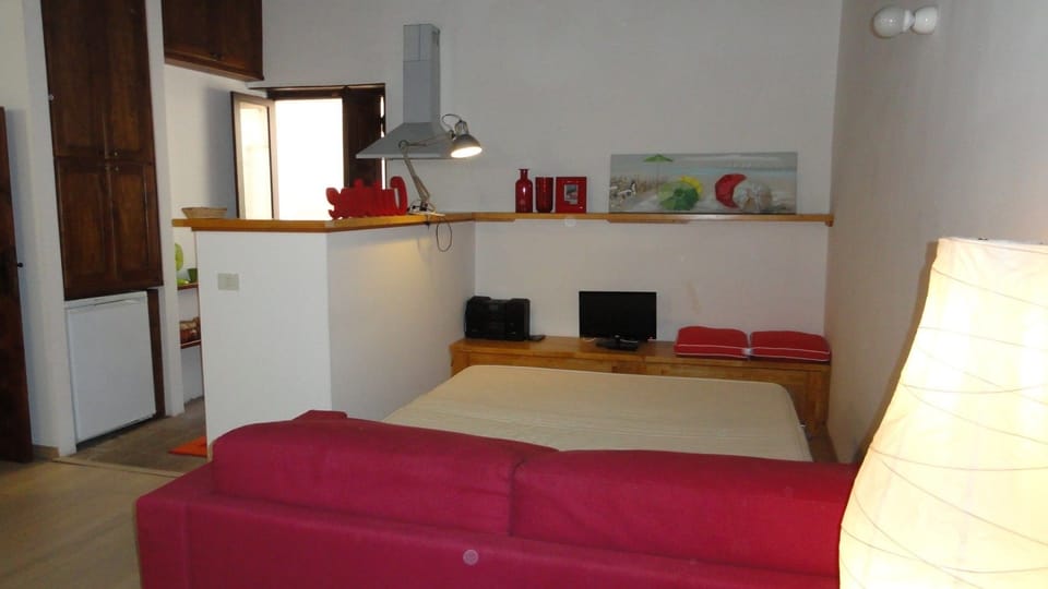 Apartment, 1 Bedroom | Living area | Flat-screen TV