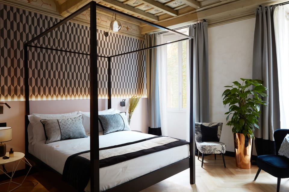 Down comforters, minibar, in-room safe, blackout drapes