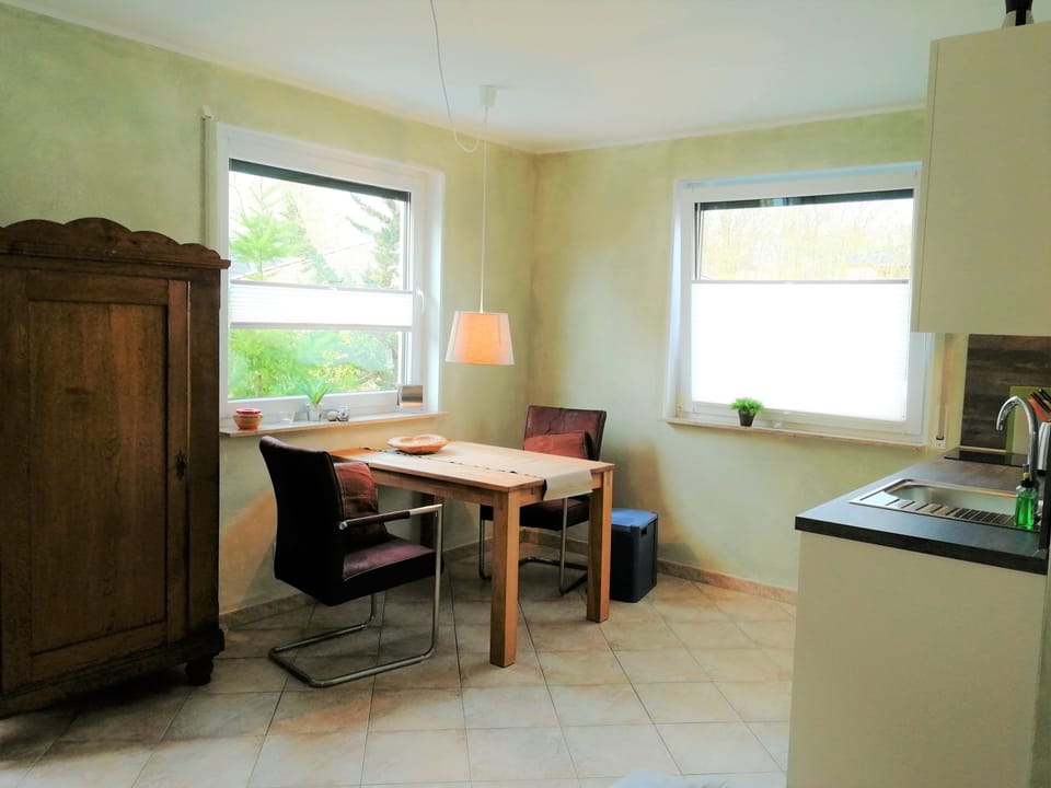 Basic Studio, Patio, Beachfront | Living area | 82-cm flat-screen TV with satellite channels, TV