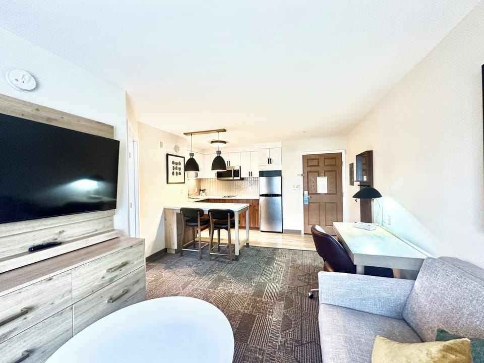 Suite, 1 Bedroom, Kitchen (1 King) | Living area | 50-inch flat-screen TV with cable channels, TV