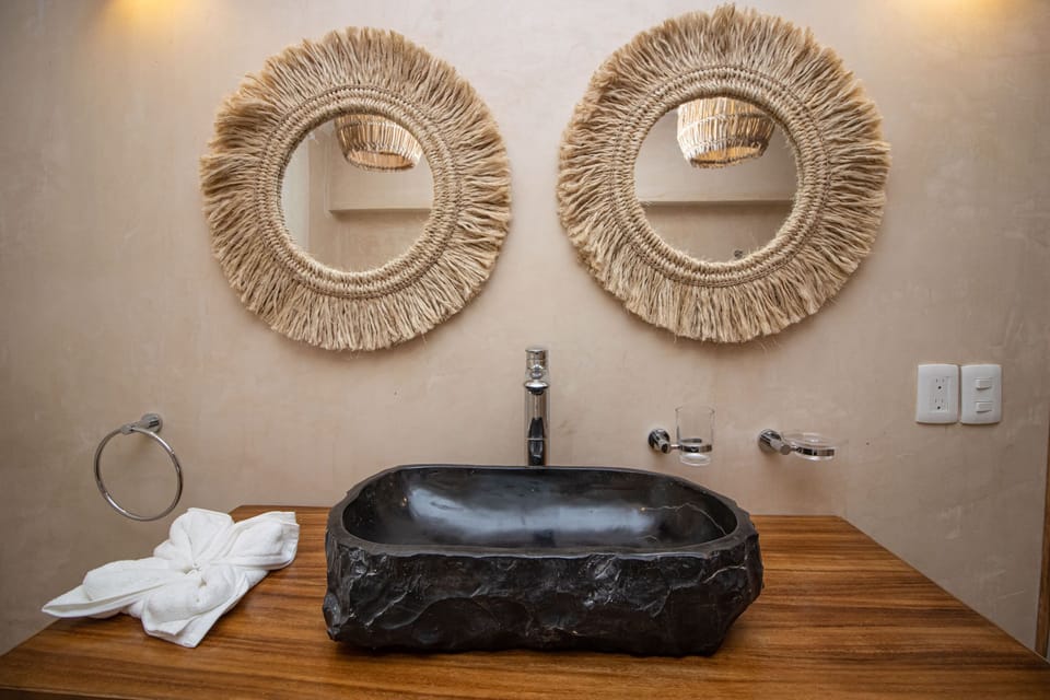 Two-Bedroom Suite | Bathroom | Shower, towels, soap, shampoo