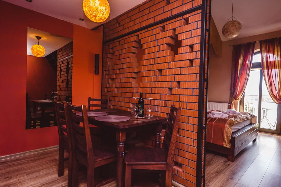 Quadruple Room | Living area | Flat-screen TV, DVD player