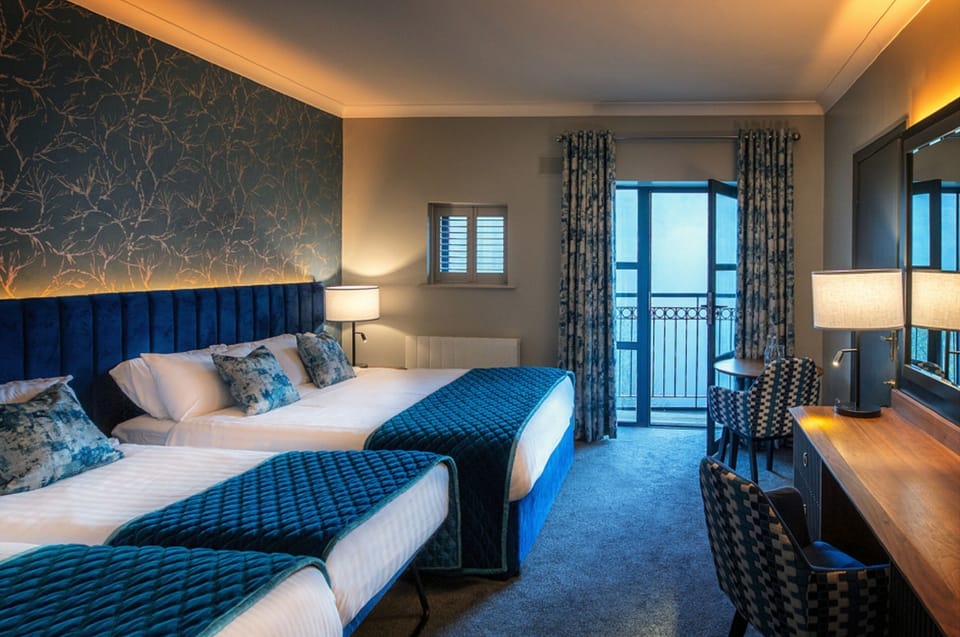 Standard Family Room (2 Adults + 2 Children) | In-room safe, individually decorated, desk, iron/ironing board