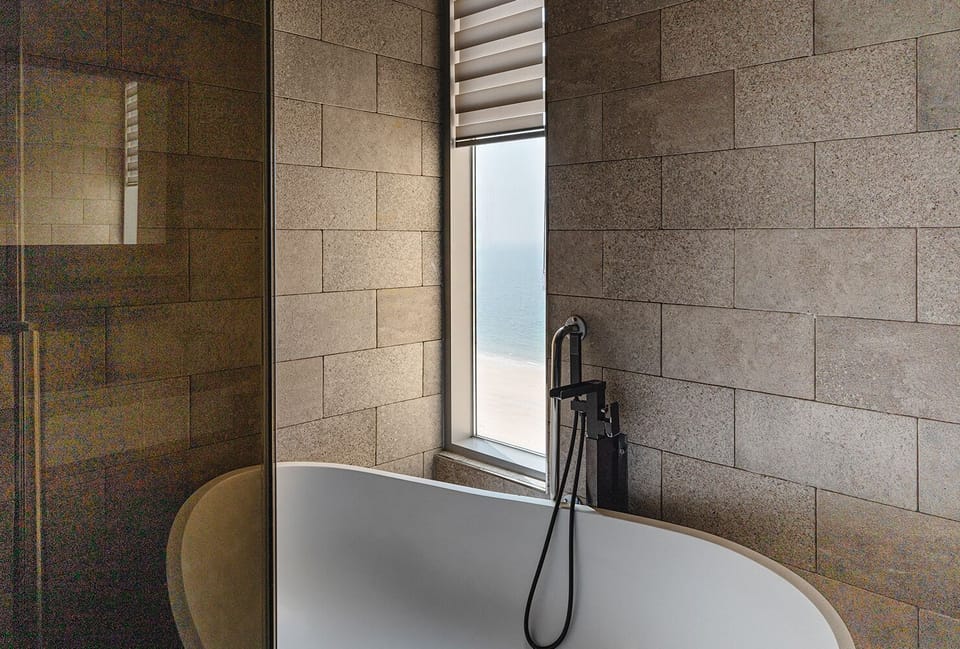 Rooftop Lounge, Ocean View | Bathroom | Shower, free toiletries, hair dryer, slippers