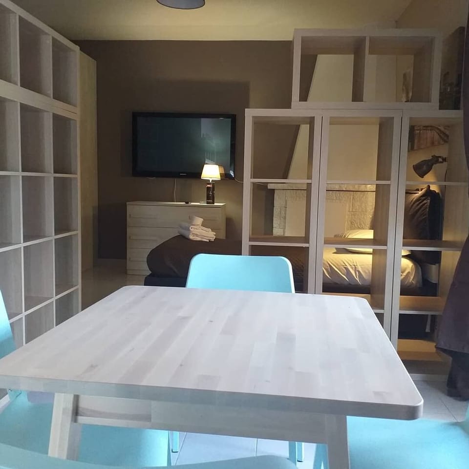 Comfort Triple Room | Living area | Flat-screen TV