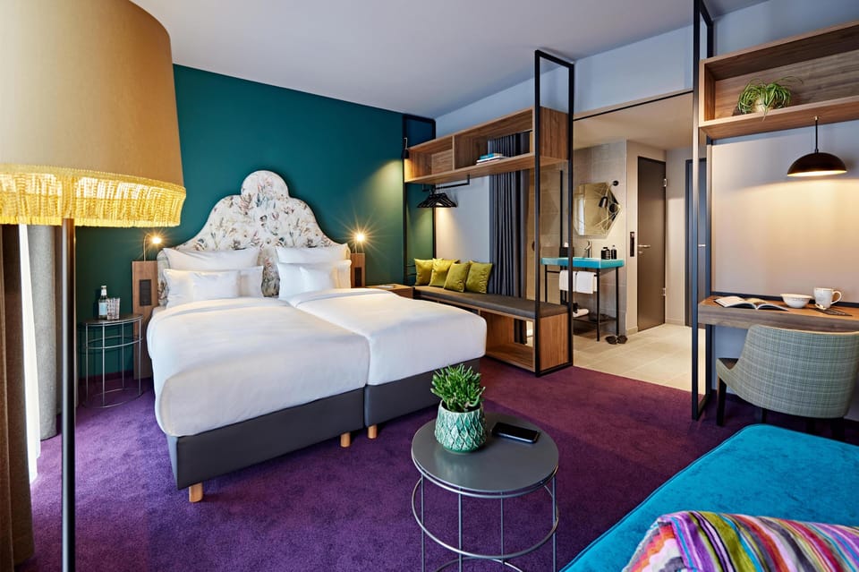 Hypo-allergenic bedding, free minibar items, in-room safe