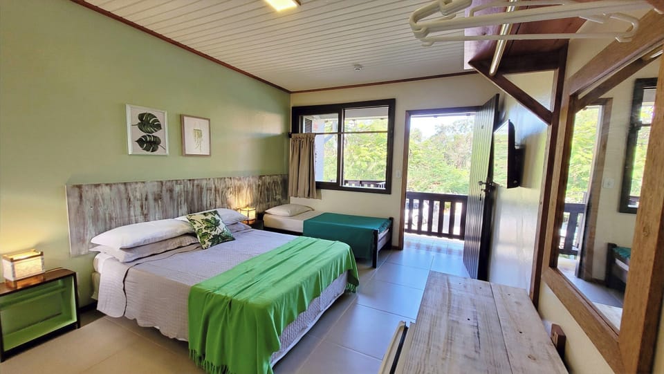 Comfort Triple Room | Minibar, desk, laptop workspace, iron/ironing board
