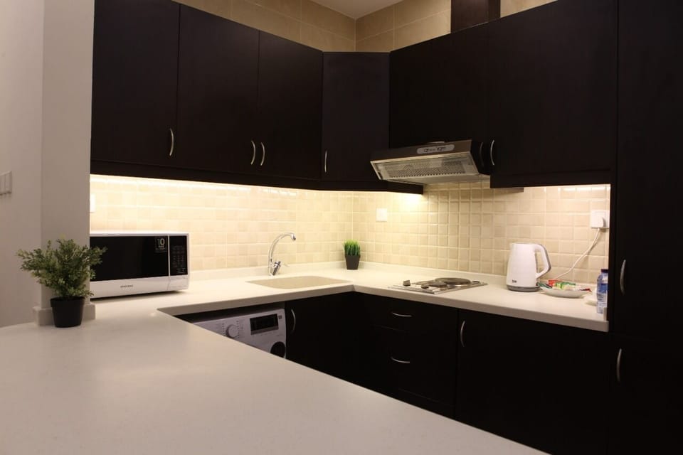 Fridge, coffee/tea maker, electric kettle, highchair