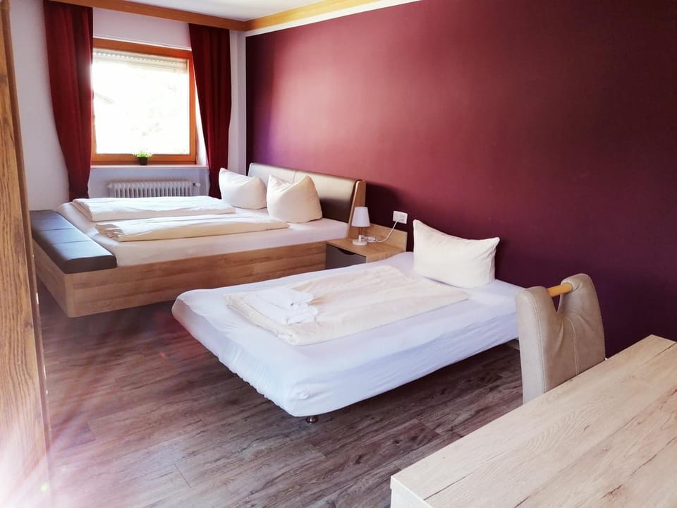 Desk, free WiFi, bed sheets