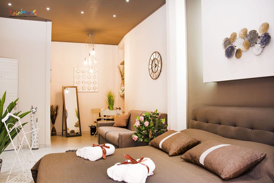 Deluxe Quadruple Room, Balcony, City View (Hug) | Free WiFi, bed sheets