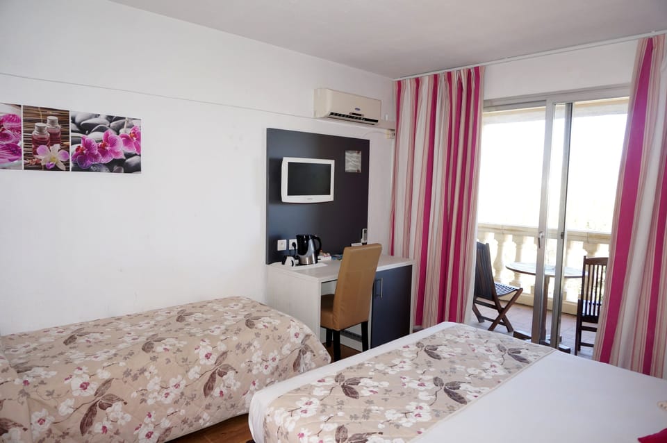 Triple Room, Balcony, City View | Desk, iron/ironing board (on request), WiFi (free)
