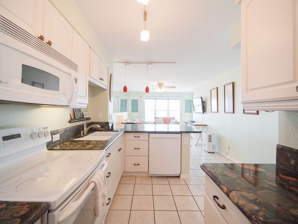 Condo, 2 Bedrooms | Private kitchen | Coffee/tea maker, fridge, microwave, oven