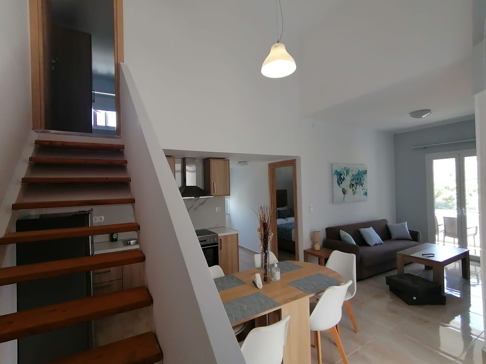 Deluxe Apartment (Duplex, 4 Persons) | Living area | Flat-screen TV