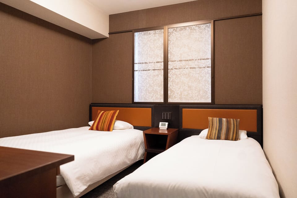 Premium bedding, down comforters, desk, blackout drapes