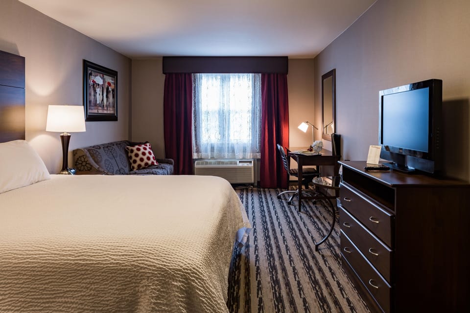 Desk, blackout drapes, WiFi (free), bed sheets