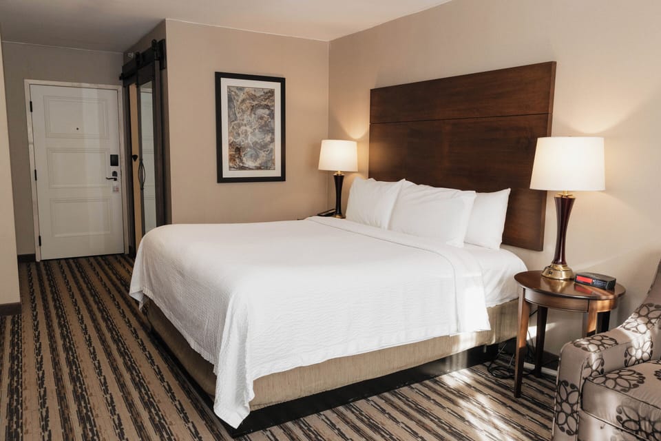 Desk, blackout drapes, WiFi (free), bed sheets