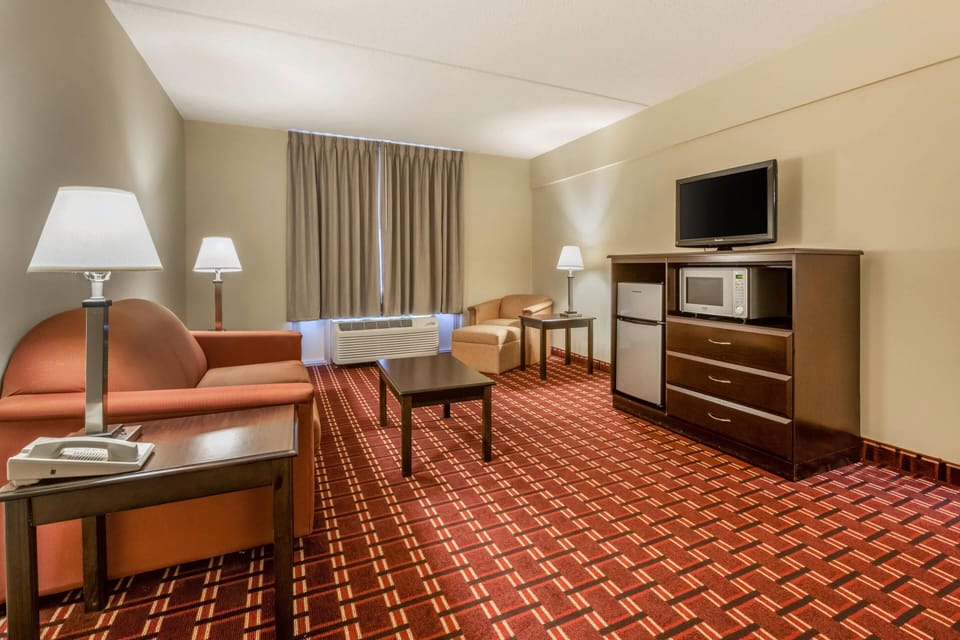 Suite, 1 King Bed with Sofa bed, Non Smoking | Iron/ironing board, free cribs/infant beds, free WiFi, bed sheets