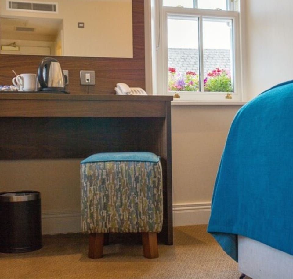 Deluxe Double Room | Desk, laptop workspace, blackout drapes, iron/ironing board