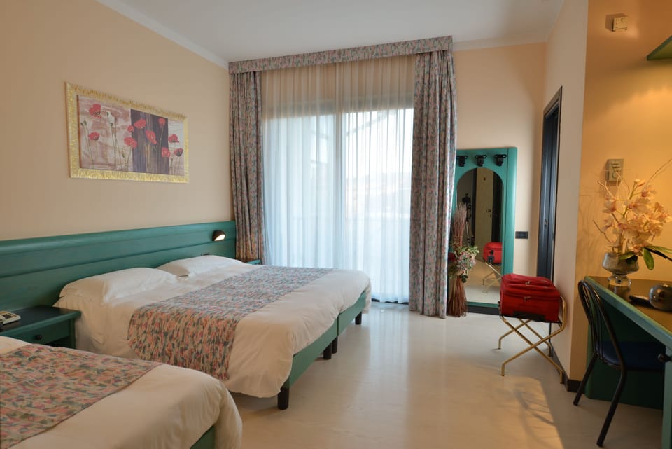 Triple Room | Frette Italian sheets, Select Comfort beds, minibar, in-room safe