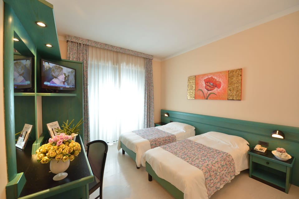 Frette Italian sheets, Select Comfort beds, minibar, in-room safe