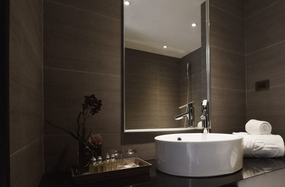 Hair dryer, slippers, bidet, towels