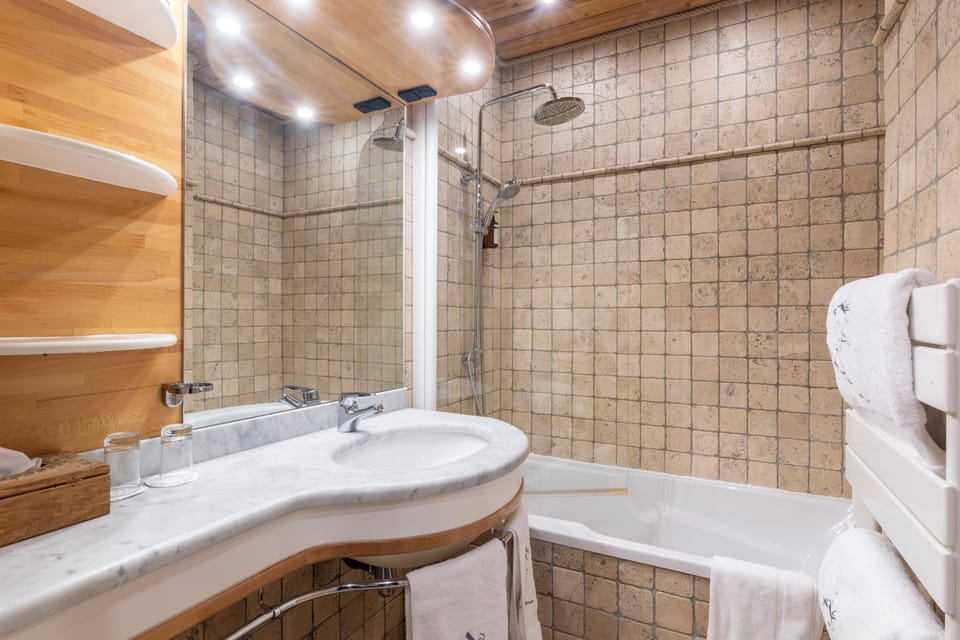 Shower, free toiletries, hair dryer, slippers