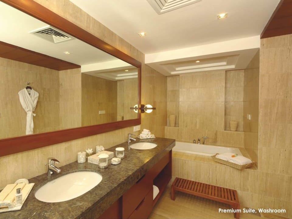 Premium Suite | Minibar, in-room safe, individually decorated, individually furnished