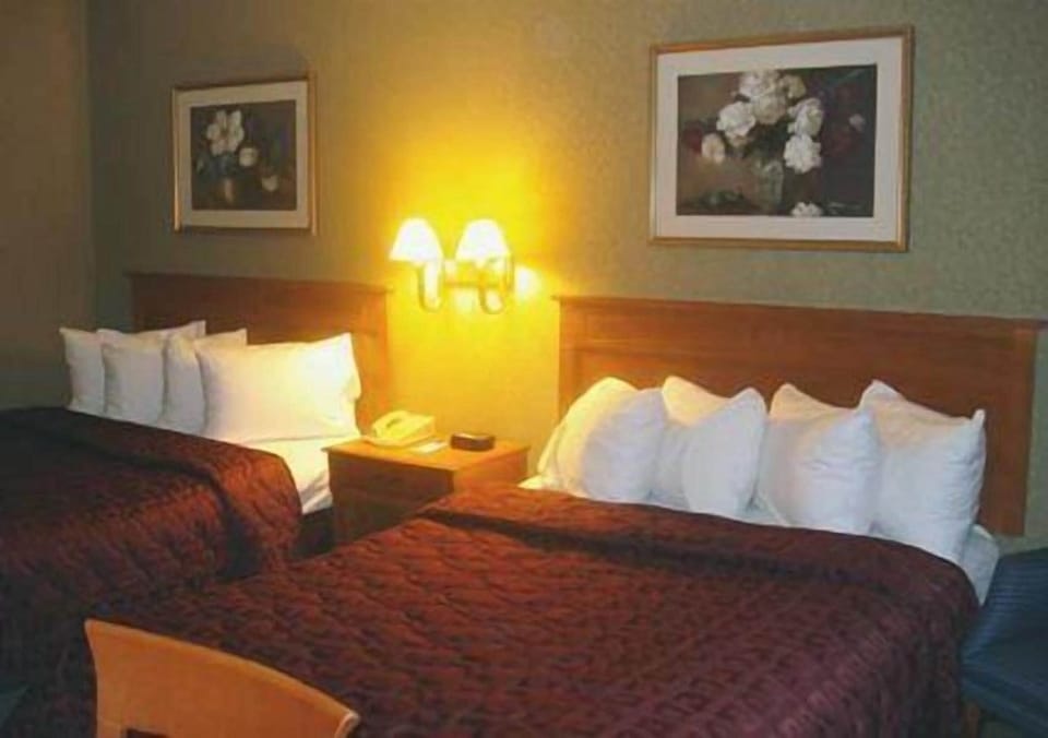 Individually furnished, desk, blackout drapes, iron/ironing board