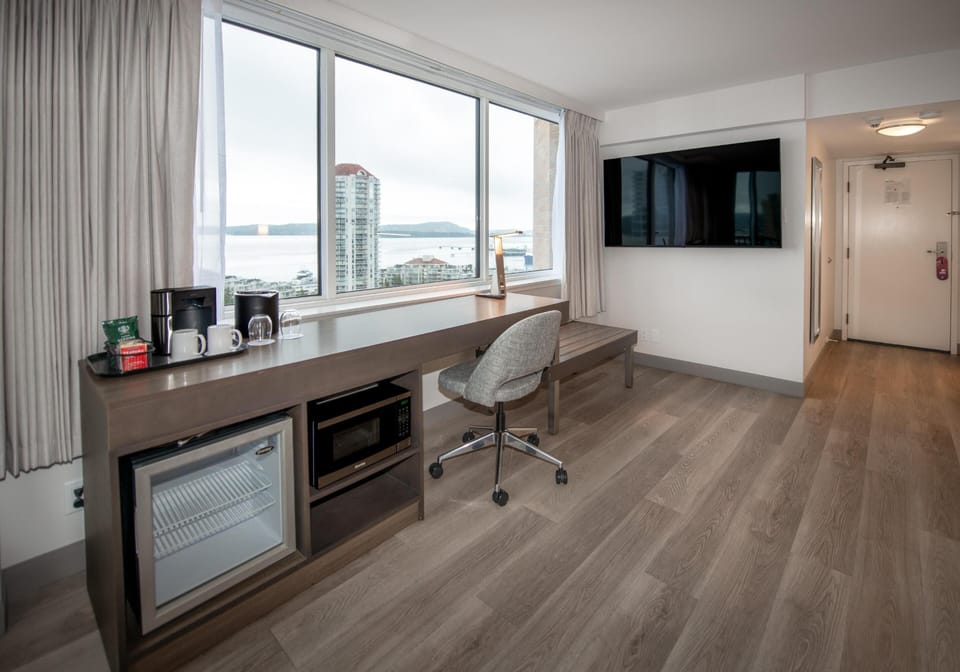 Room, 1 King Bed, Harbor View (Coast Premium King with Ocean View) | In-room safe, desk, blackout drapes, iron/ironing board