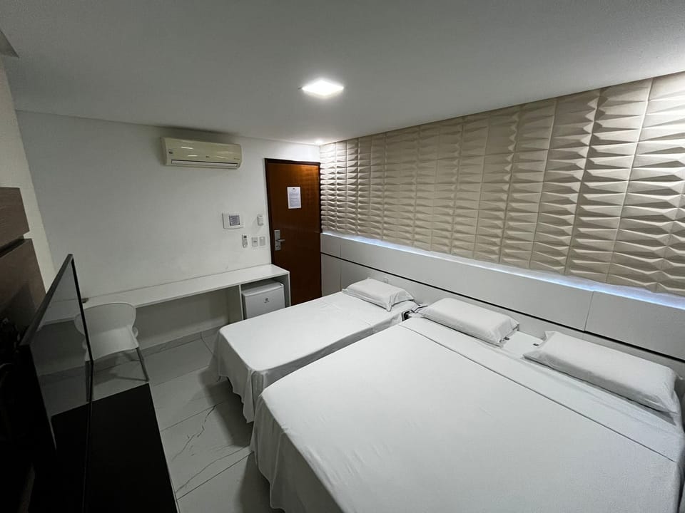 Pillowtop beds, desk, laptop workspace, blackout drapes
