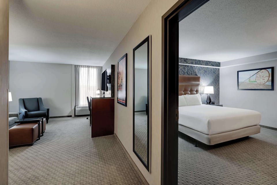 Suite, 1 King Bed with Sofa bed, Accessible (Sofa Sleeper, Tub, 2 Rooms) | Desk, laptop workspace, blackout drapes, iron/ironing board