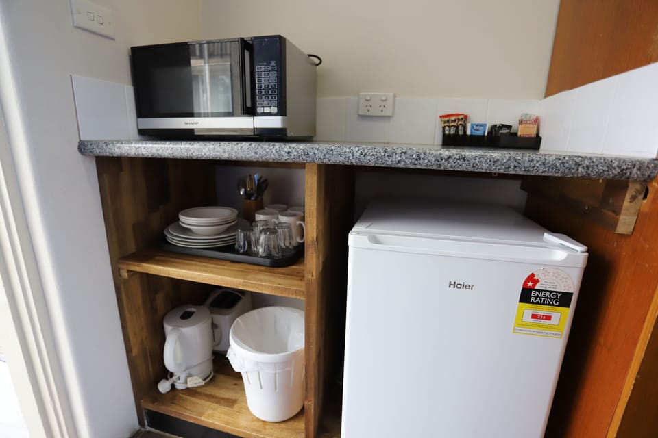 Family Room | Private kitchen | Coffee/tea maker, fridge, microwave, electric kettle