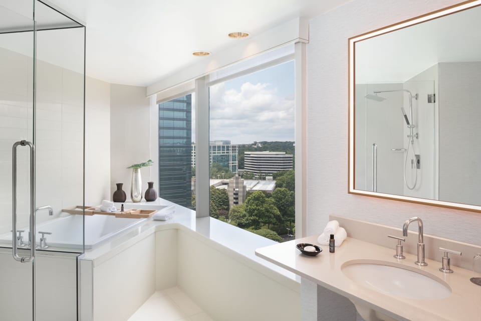 Designer toiletries, hair dryer, towels