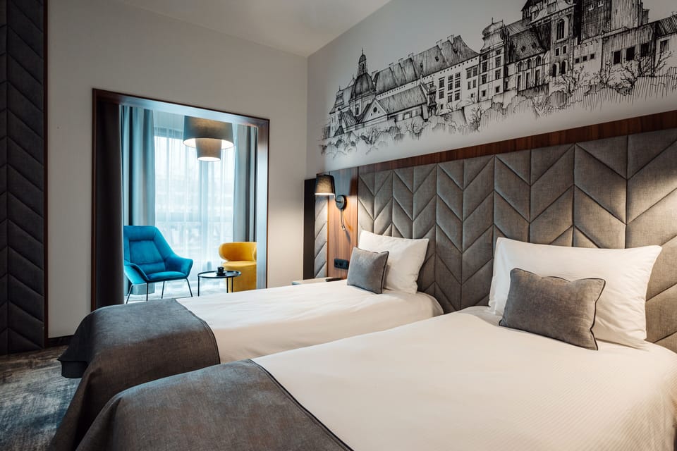 Deluxe Double or Twin Room | Minibar, in-room safe, desk, blackout drapes