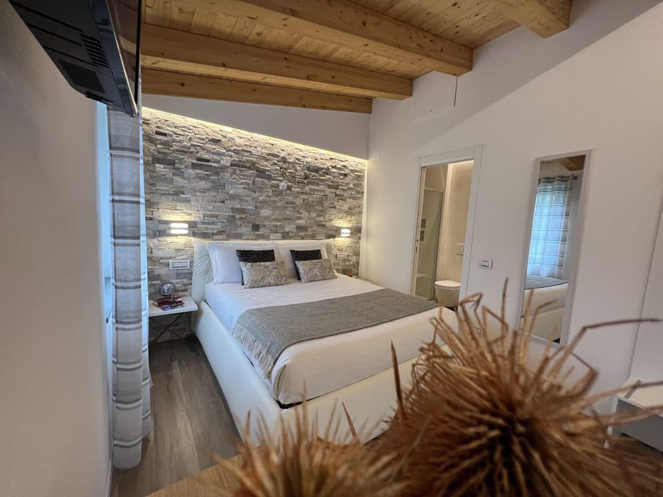 Superior Triple Room, Garden Area | Soundproofing, free cribs/infant beds, free WiFi, bed sheets