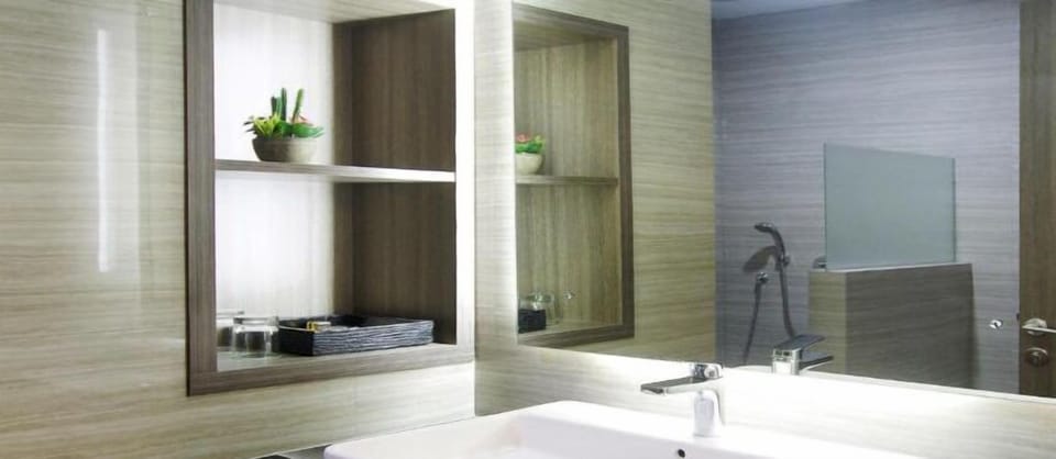 Shower, rainfall showerhead, slippers, towels